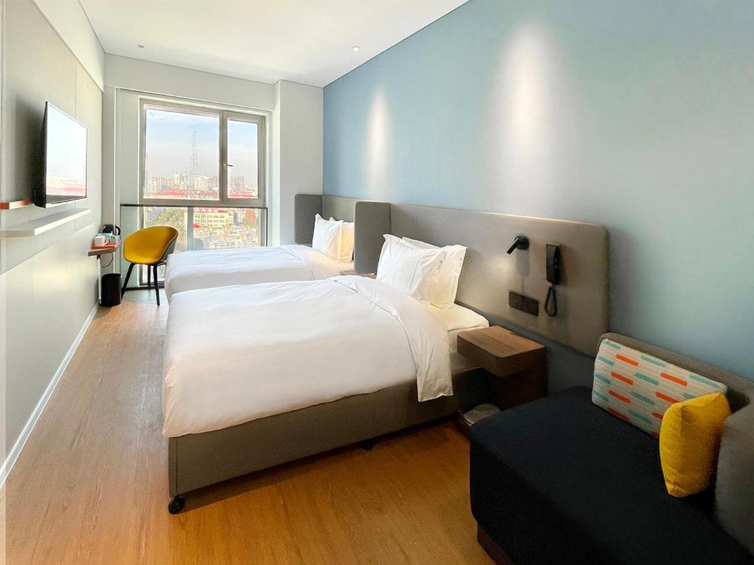 Holiday Inn Express Shanghai Baoyang By Ihg Экстерьер фото